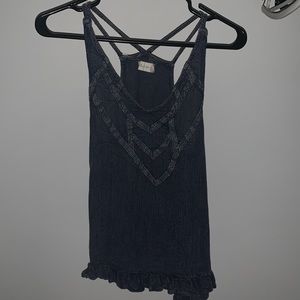 Blue tank top. Jean-ish look. Worn once or twice